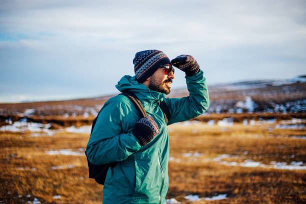 istock Man hiking in iceland 1064913714