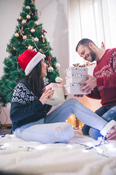 istock Man surprise woman for Christmas 1064917196