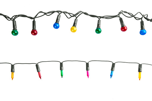 Multi colored Christmas lights isolated on white background.