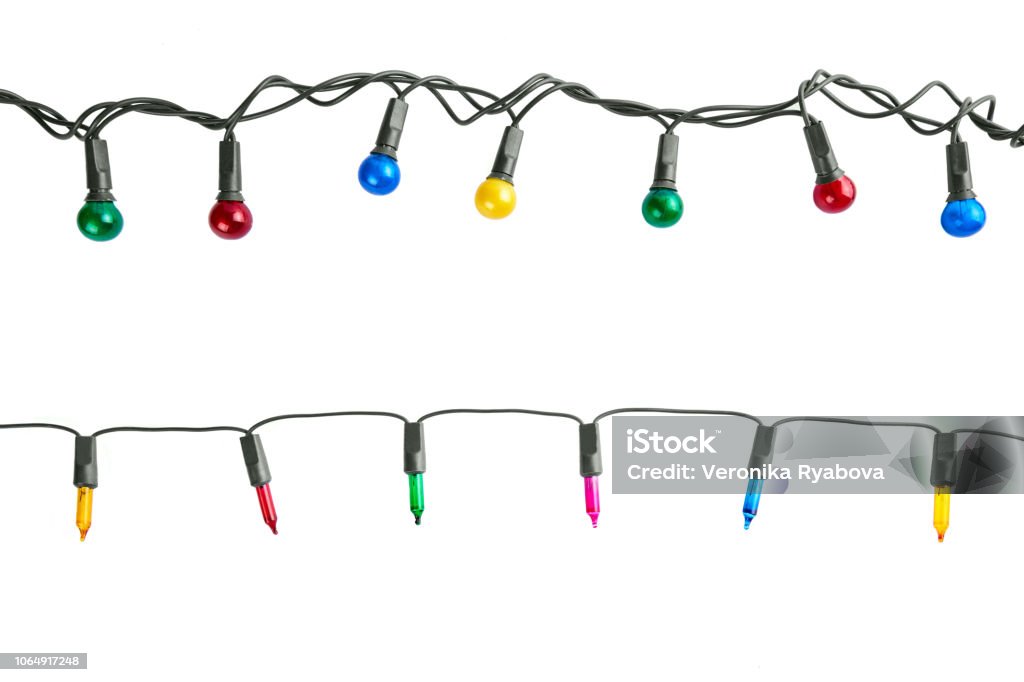 Christmas lights Multi colored Christmas lights isolated on white background. Christmas Lights Stock Photo