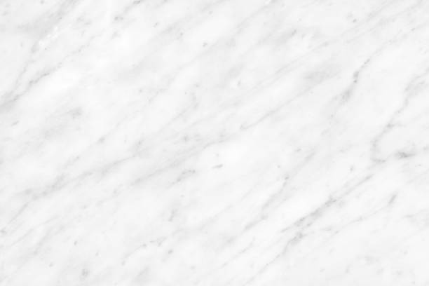 istock White Carrara Marble natural light surface for bathroom or kitchen countertop 1064917554