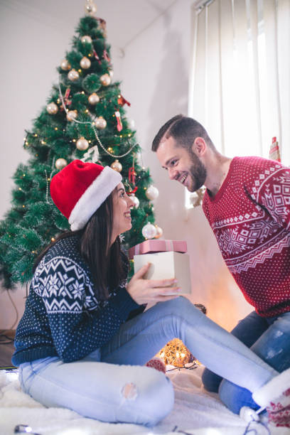 istock Man surprise woman for Christmas 1064919294