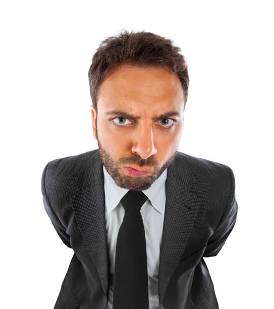 istock Young businessman with expression of indecision 1064920422