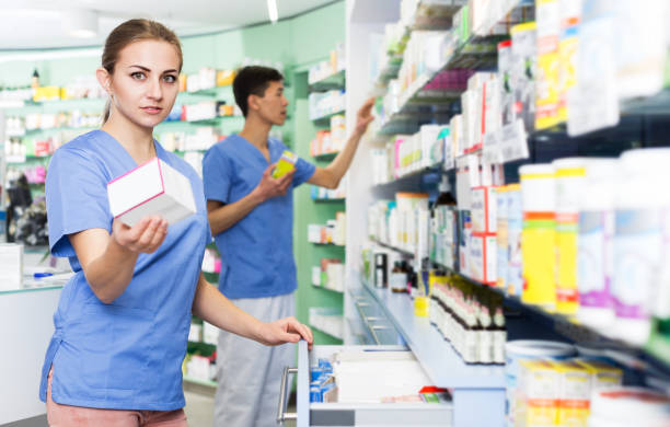 istock Pharmacist looking medicines in lockers 1064924180
