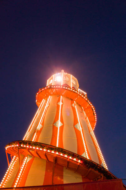 istock Illuminated Helter Skelter at Night 1064926012
