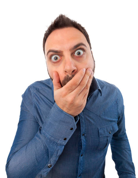 istock Young man with expression of fright. 1064926028