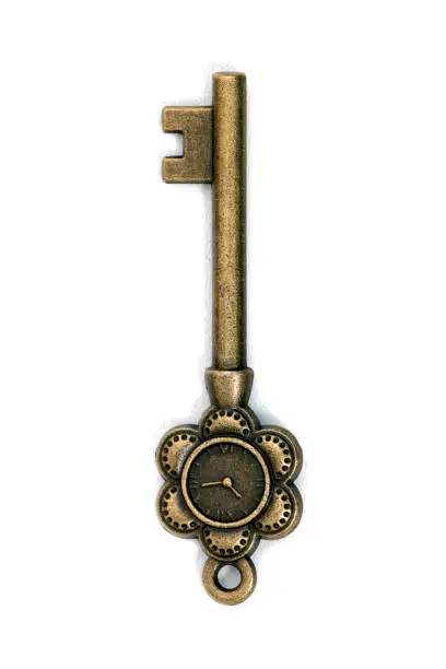 vintage fantasy detailed golden key isolated on a white background.