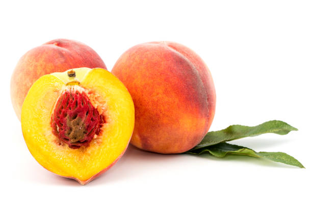 istock Ripe peach fruit isolated on white background cutout. Selective focus. 1064931512
