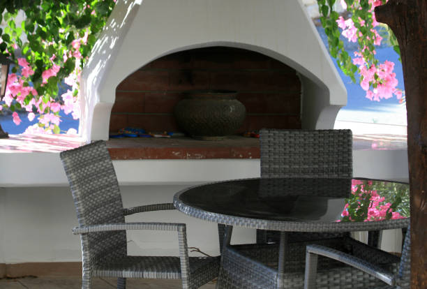 istock Barbecue place surrounded by flowers 1064932448