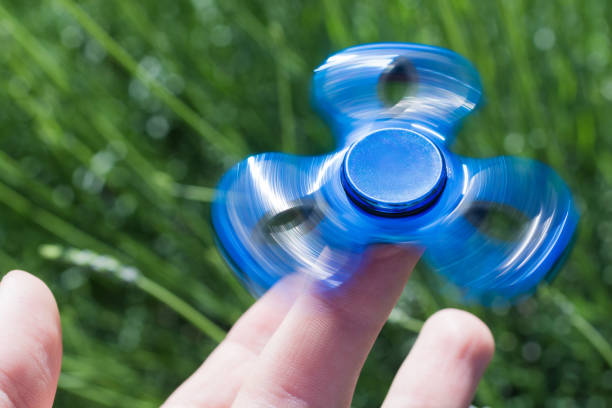 Rotating Spinner 3,700+ Rotating Spinning Top Stock Photos, Pictures & Royalty-Free ...