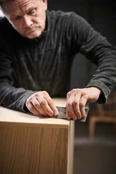 istock Working cabinetmaker and handmade furnitures 1064938196