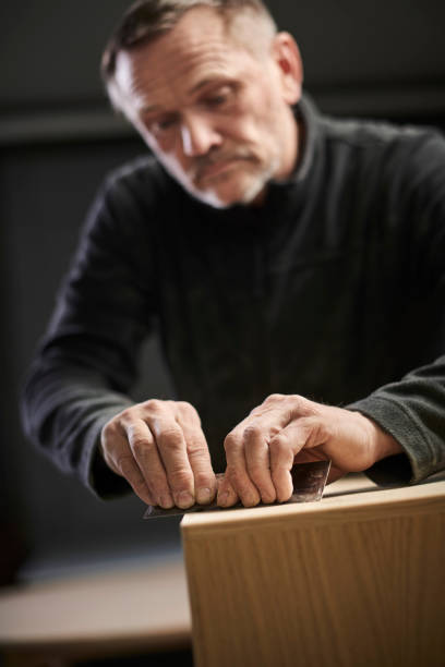 istock Working cabinetmaker and handmade furnitures 1064938220