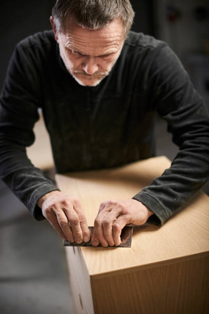 istock Working cabinetmaker and handmade furnitures 1064938302