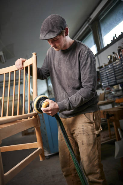 istock Working cabinetmaker and handmade furnitures 1064939182