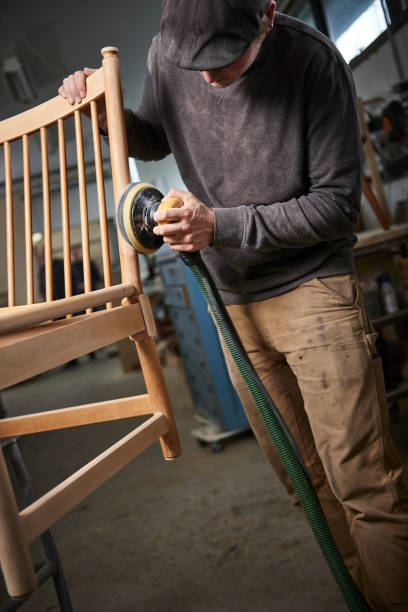 istock Working cabinetmaker and handmade furnitures 1064939200