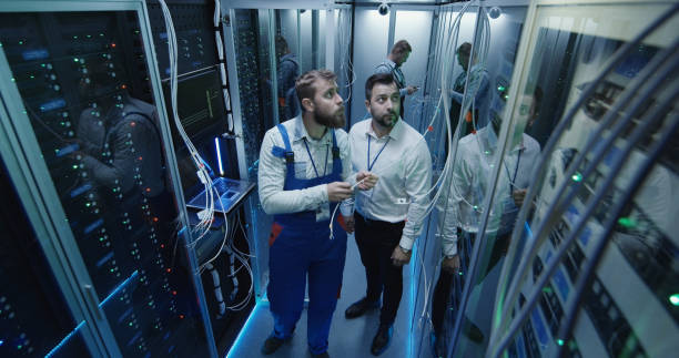 istock Top view, people work in the data center in the server room 1064940550