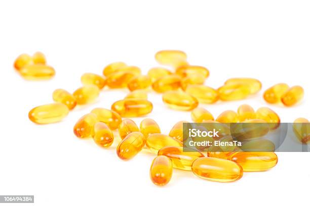 Giallo Vitamina E Pillole - Fotografie stock e altre immagini di Alimentazione sana - Alimentazione sana, Antibiotico, Antidolorifico