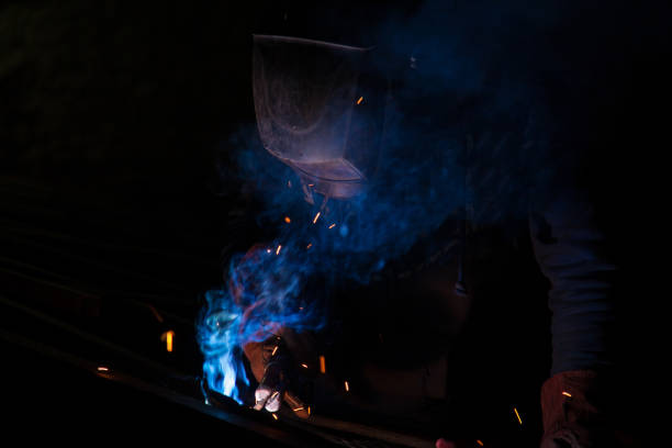 istock Industrial Welder With Torch 1064944170