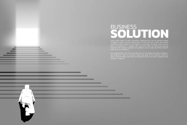 istock Silhouette of businessman ready to step up on stair to exit the door. 1064947548