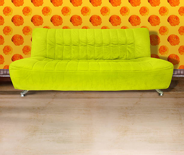 istock Lime green couch against flower wallpaper 106494759