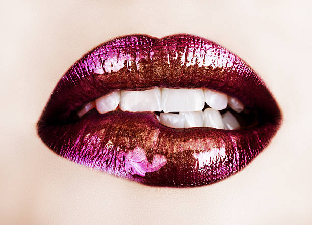 purple lipstick lips stock photo