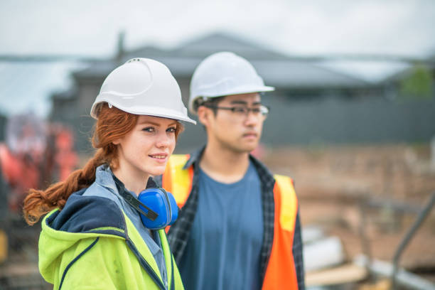istock Working outdoors in all weathers, tough work in construction industry 1064953482