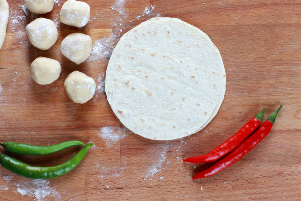 istock Tortillas and making Mexican Wrap 1064958456
