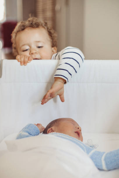 istock Baby boy and big brother 1064961112
