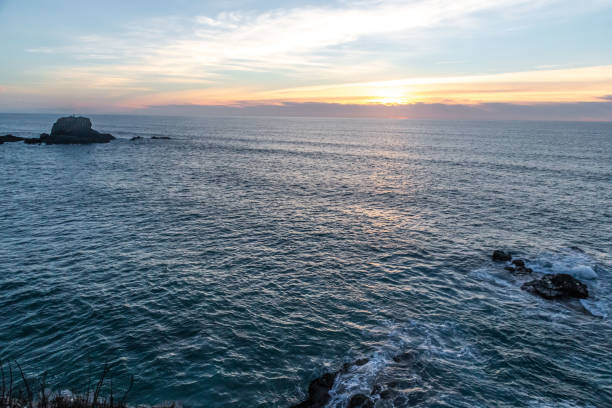 istock sunset at the atlantic sea in portugal 1064962084