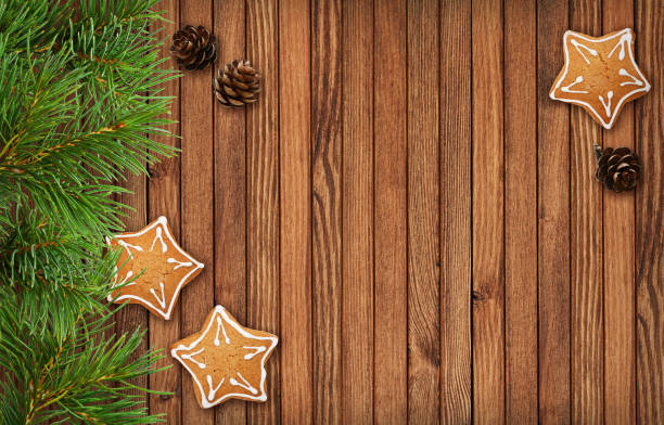 istock Christmas decorations and cookies on wood 1064965414