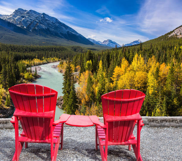 istock Two red chairs stand by the lake 1064967068