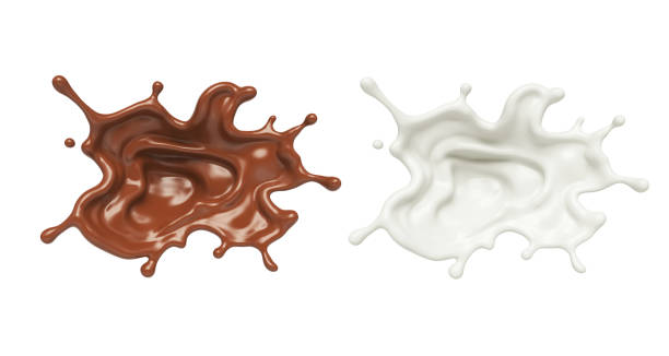istock milk and chocolate splash isolated on white background. 1064969524