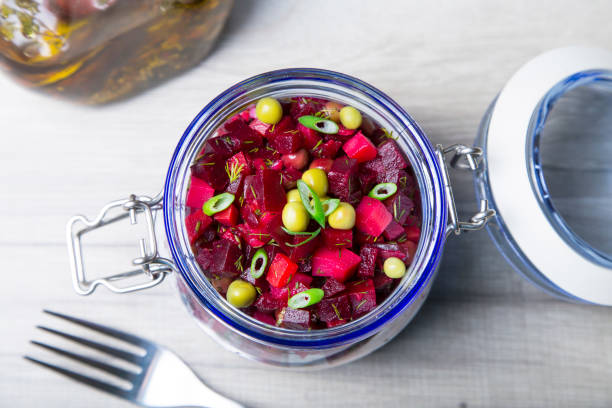istock Vinaigrette salad with olive (vegetable) oil in a jar. 1064972022