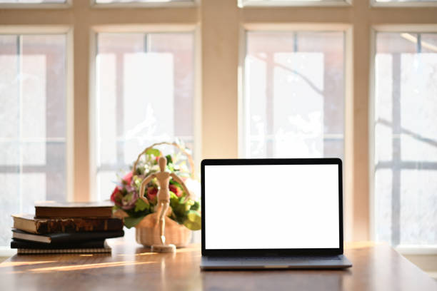 istock Laptop workspace and office supplies. 1064986228