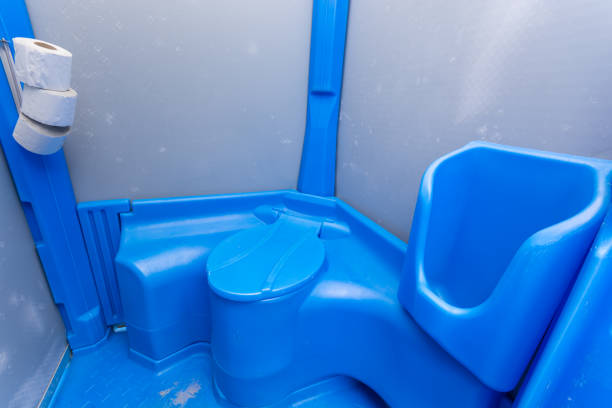 Flushing toilet with blue light.
