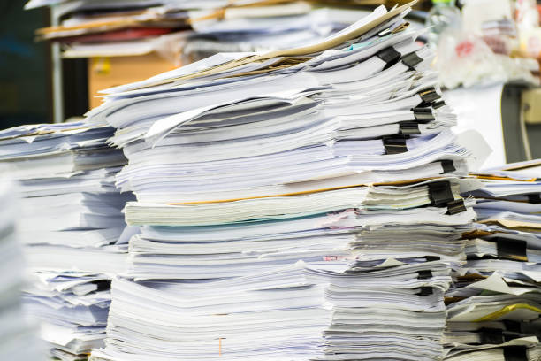 istock Stack of paper in the office. 1064988136