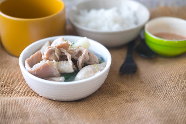 istock Suki in broth with pork and fresh mixed vegetables 1064989032