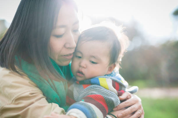 istock Mother and baby relaxed in the park 1064990564