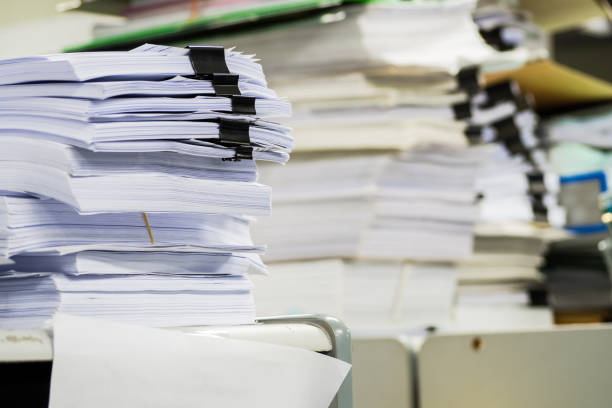 istock Piles of paper in the office 1064990742
