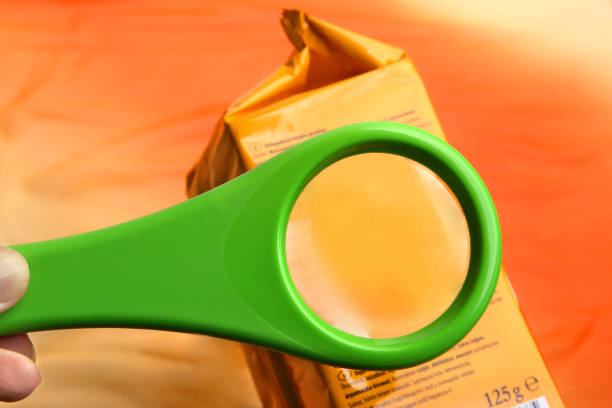 istock Empty magnifying glass on food additives label with copy space for your text. 1064992366