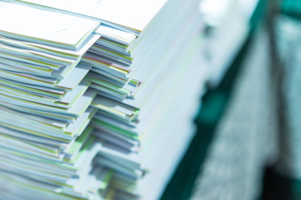 istock Colorful piles of paper stacked on a table placed. 1064997148