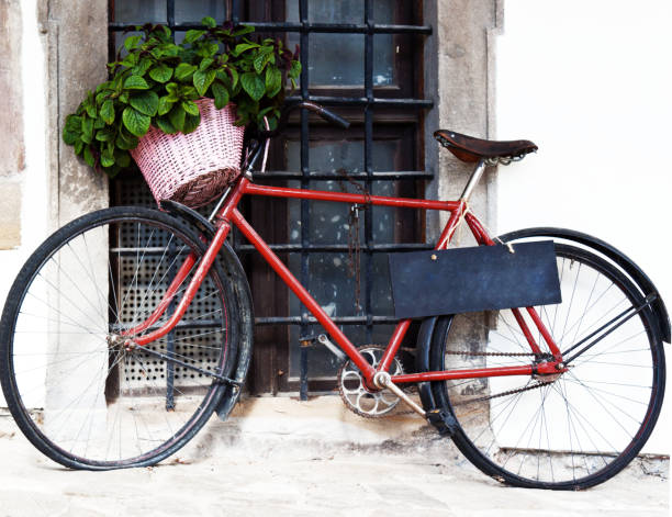 istock rustic bicycle with basket full of mint leaves and blackboard suspended from saddle 1064997938