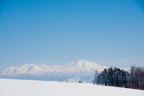 istock Winter mountain and blue sky Mt.Daisetu 1064999796