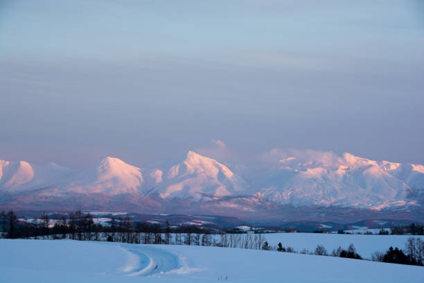 istock Snowy mountains at dusk Tokachi mountain range 1064999954