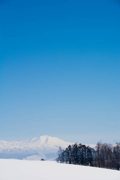 istock Winter mountain and blue sky Mt.Daisetu 1065000308