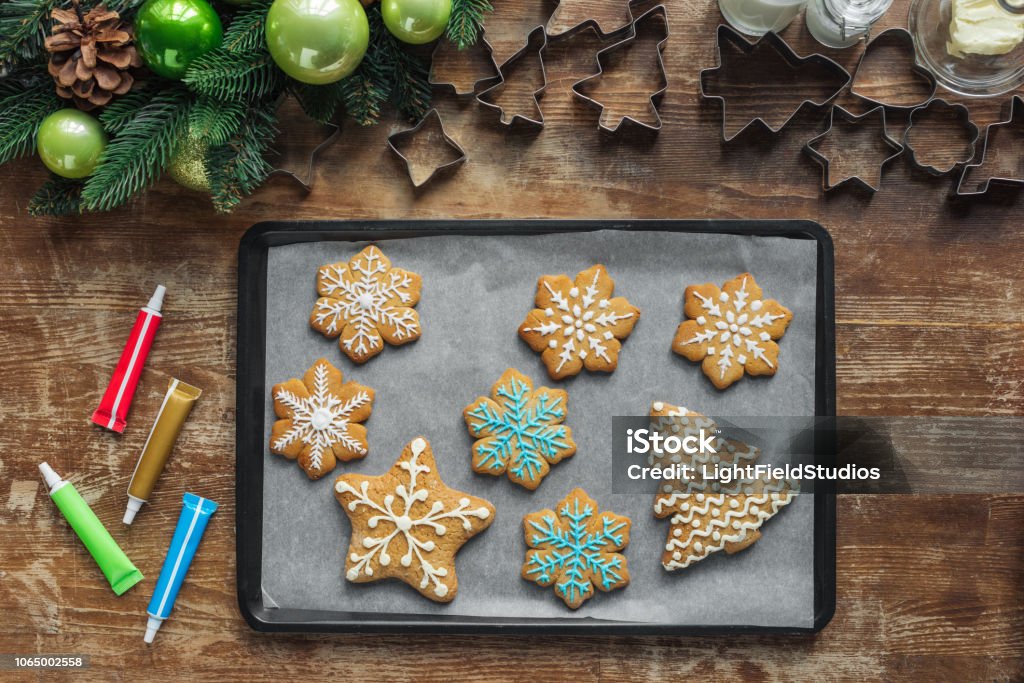https://media.istockphoto.com/id/1065002558/photo/flat-lay-with-christmas-cookies-on-baking-pan-christmas-wreath-and-cookie-cuttrers-on-wooden.jpg?s=1024x1024&w=is&k=20&c=xWgzTuxhgjiwP1ZR6Bvw8fsIUwKtNM_Eap4ID-6EHoc=