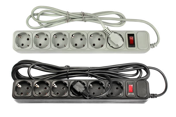 istock Black and white plastic power strips, isolated on white background 1065003404