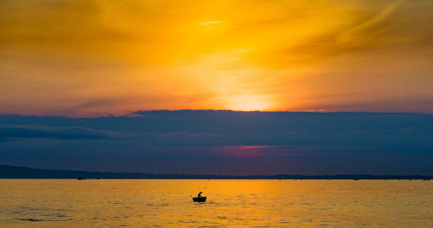 istock dawn on the sea 1065004924