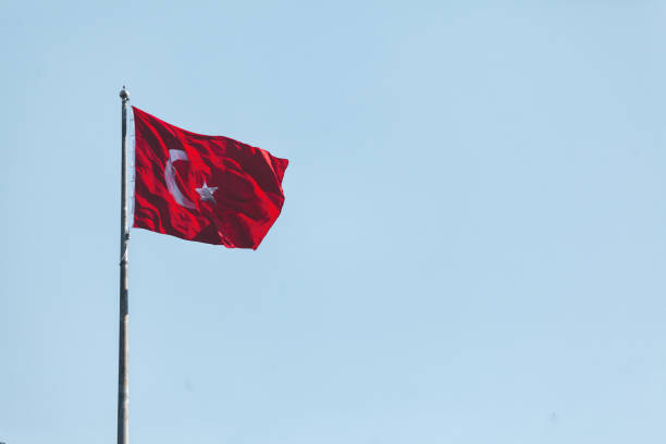 istock turkey flag in a sunny day with body copy. 1065005778