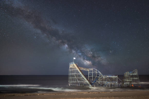 milky way galaxy over jet star roller coaster ride after hurricane sandy - jet way imagens e fotografias de stock